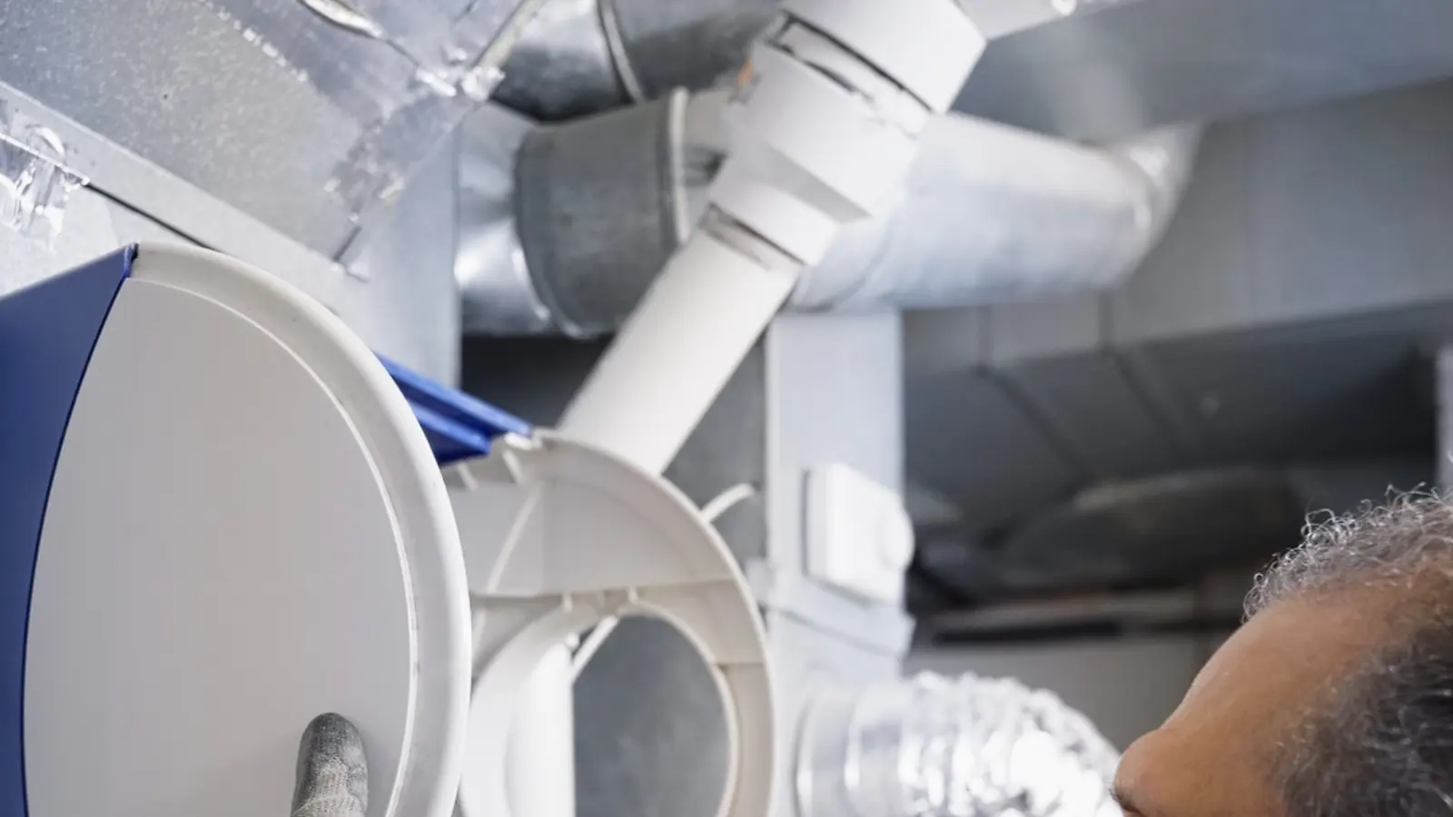 H&C technician sealing home ductwork