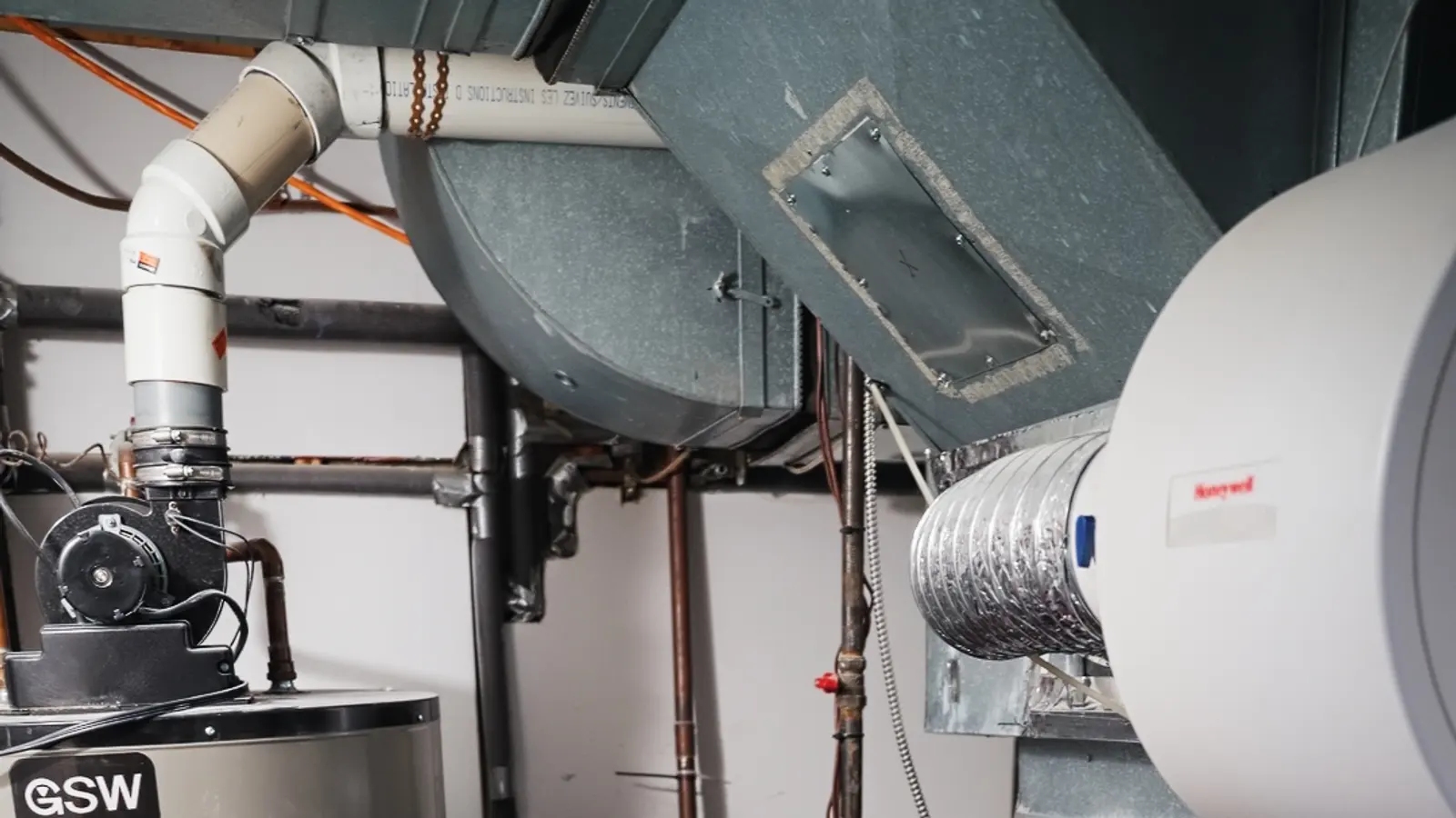 H&C technician diagnosing a water heater