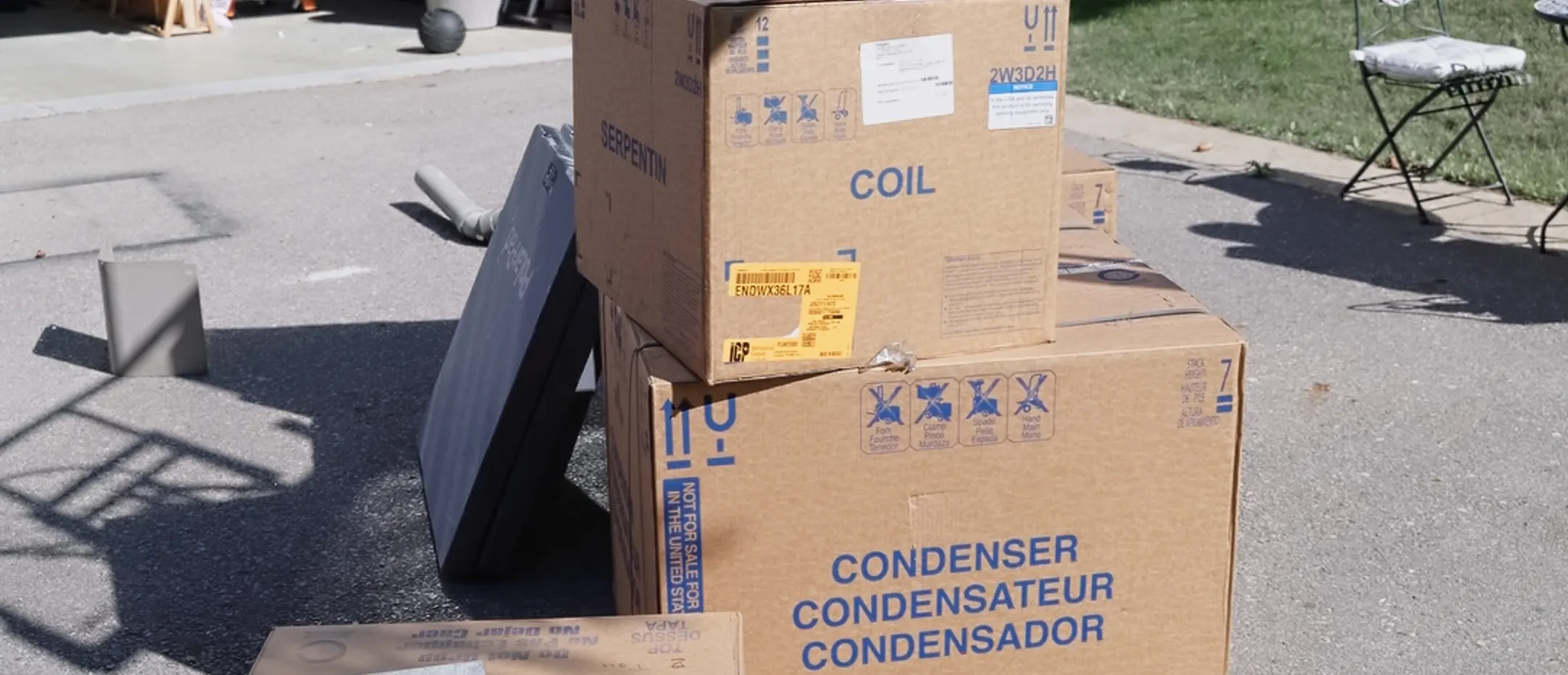 HVAC equipment staged on site for a new construction install